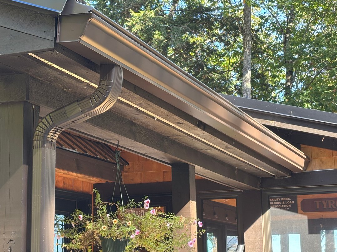 Bronze aluminum gutter on a Maine cottage
